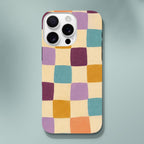 Coque iPhone Damier en couleurs, carreaux crème, jaunes, turquoise et violets.