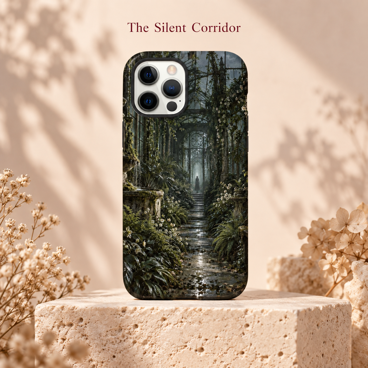 Coque iPhone The Silent Corridor au motif de serre gothique, présentée sur un socle en pierre dans un décor beige fleuri.